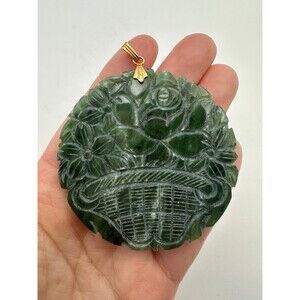 Large carved green nephrite jade pendant